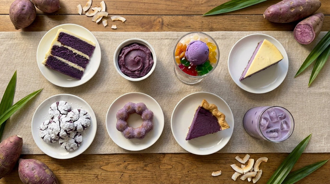 Grand overhead spread of various ube desserts on a wooden table — ube cake slice, ube halaya bowl, halo-halo glass, ube cheesecake, crinkle cookies, mochi donut, ube pie slice