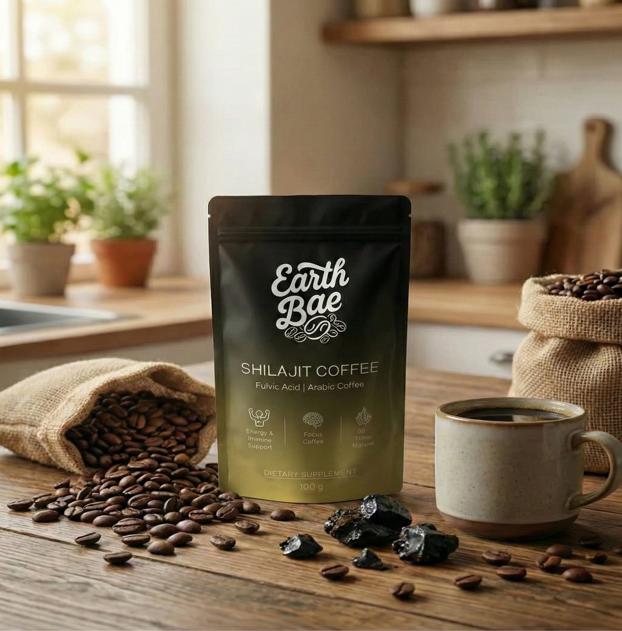 Earth Bae organic Shilajit Coffee package on a kitchen counter with coffee beans and a mug.
