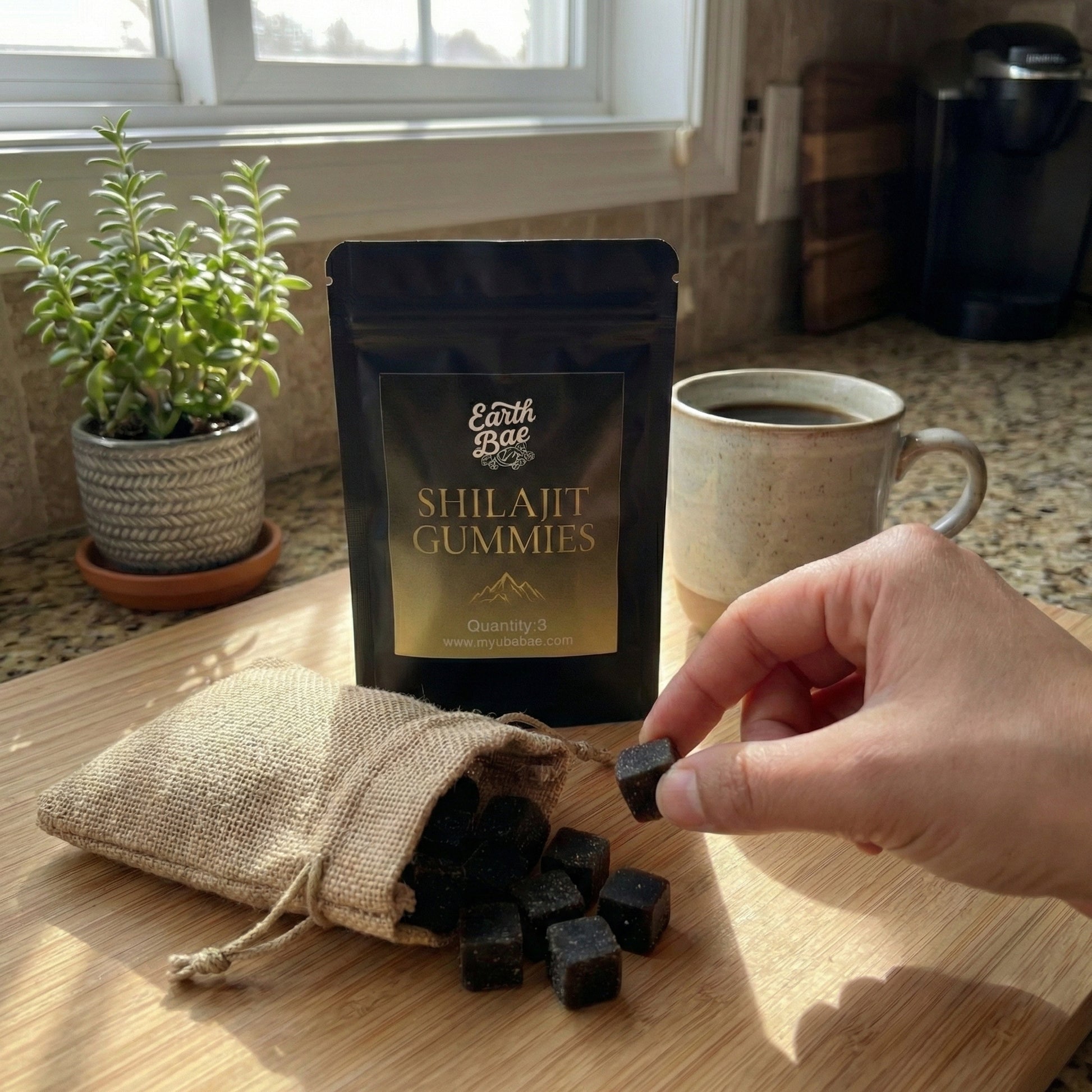 Hand holding a Shilahat Gummy